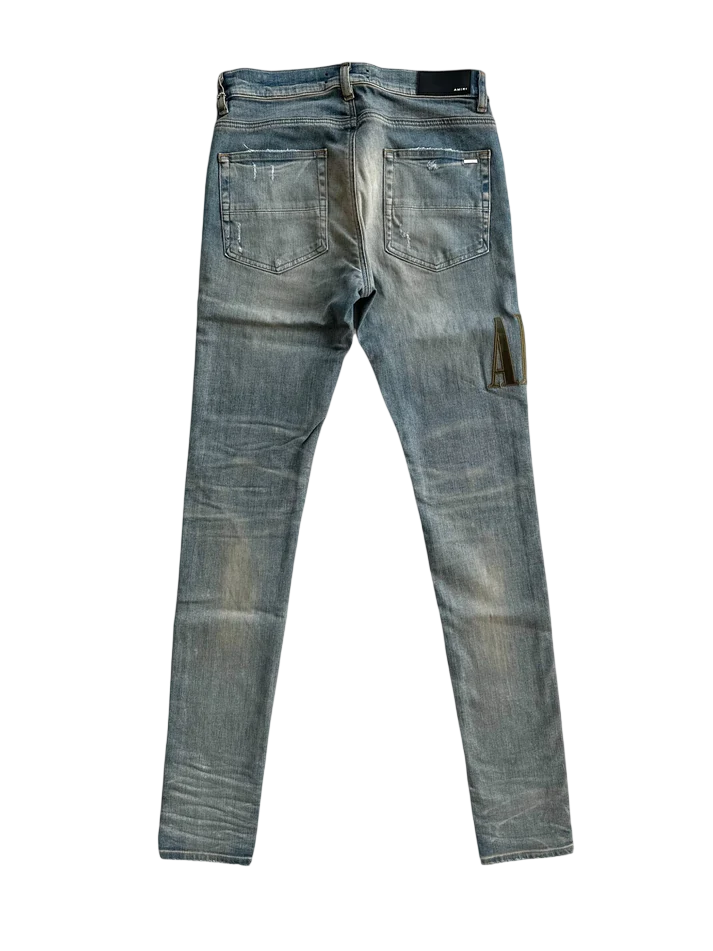 AMIRI CLAY INDIGO CAMOFLAUGE CORE APPLIQUE LOGO JEANS